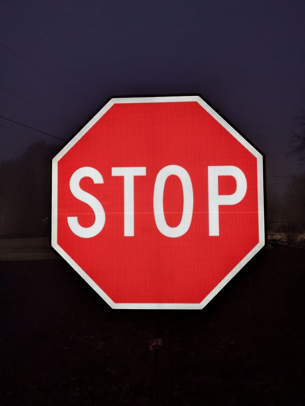 APEX I Alpha Unit R1-1 STOP sign at low LED brightness, front view